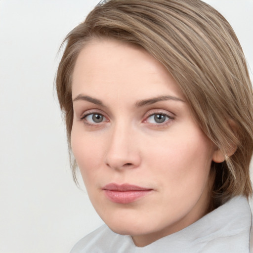 Neutral white young-adult female with medium  brown hair and grey eyes