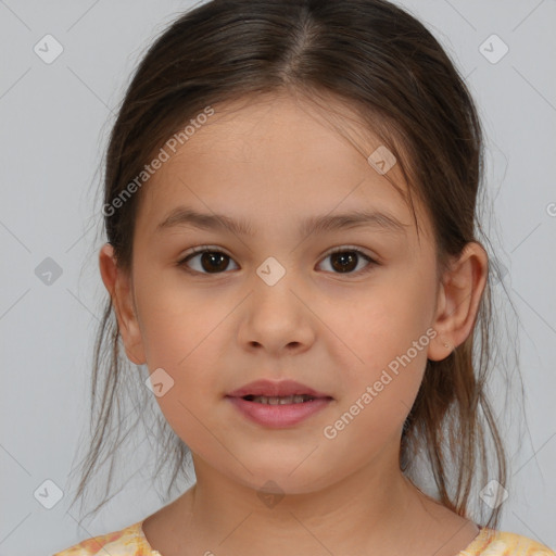 Joyful white child female with medium  brown hair and brown eyes