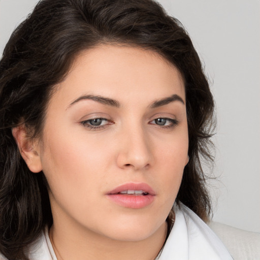 Neutral white young-adult female with medium  brown hair and brown eyes