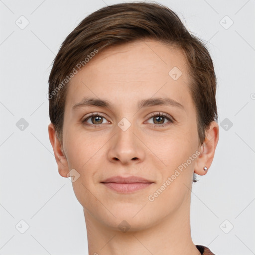 Joyful white young-adult female with short  brown hair and brown eyes