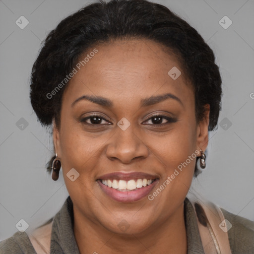 Joyful latino adult female with medium  brown hair and brown eyes