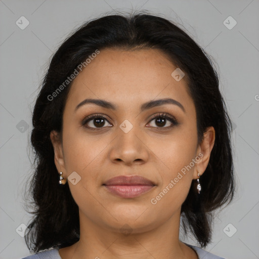 Joyful latino young-adult female with medium  brown hair and brown eyes