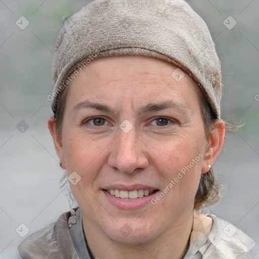 Joyful white adult female with short  brown hair and grey eyes