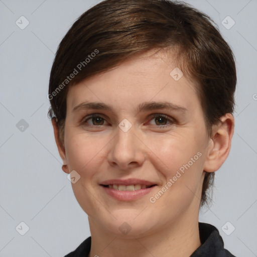 Joyful white young-adult female with short  brown hair and brown eyes