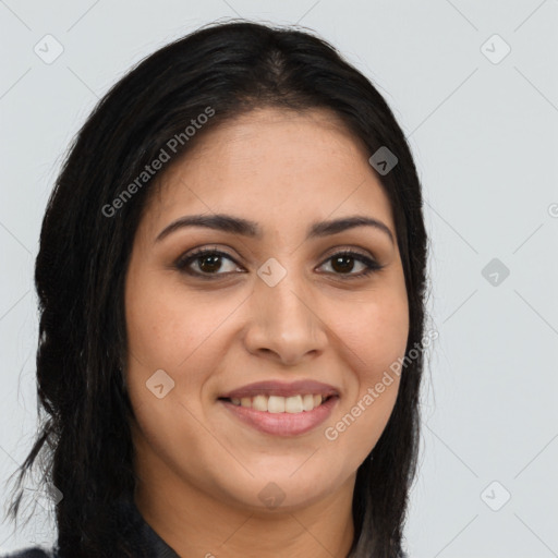 Joyful latino young-adult female with long  brown hair and brown eyes