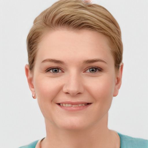 Joyful white young-adult female with short  brown hair and grey eyes