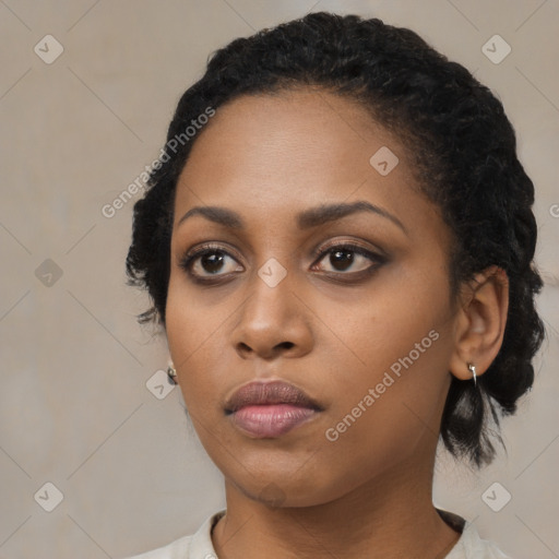 Neutral black young-adult female with short  black hair and brown eyes