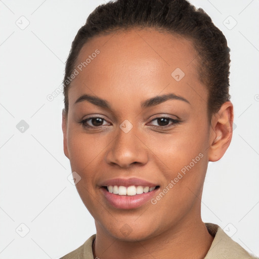 Joyful white young-adult female with short  brown hair and brown eyes