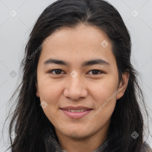 Joyful asian young-adult female with long  brown hair and brown eyes