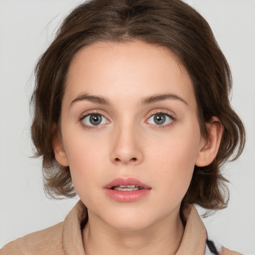 Neutral white young-adult female with medium  brown hair and brown eyes