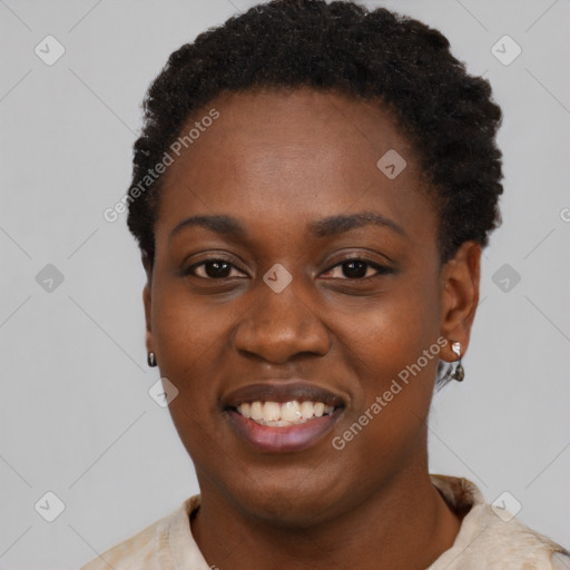 Joyful black young-adult female with short  black hair and brown eyes