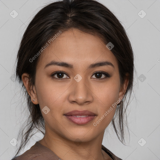 Joyful latino young-adult female with medium  brown hair and brown eyes