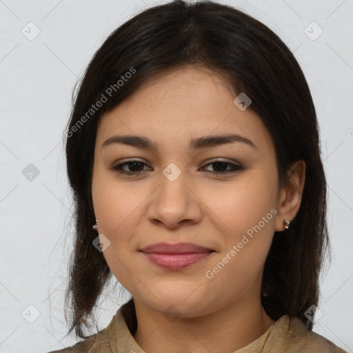 Joyful latino young-adult female with medium  brown hair and brown eyes