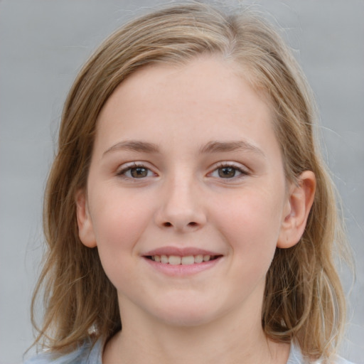 Joyful white child female with medium  brown hair and grey eyes