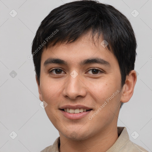 Joyful white young-adult male with short  black hair and brown eyes