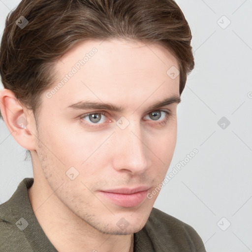 Neutral white young-adult male with short  brown hair and grey eyes