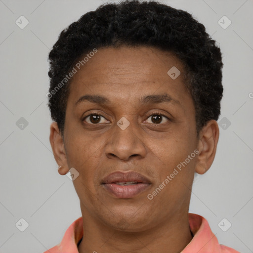 Joyful latino adult female with short  brown hair and brown eyes