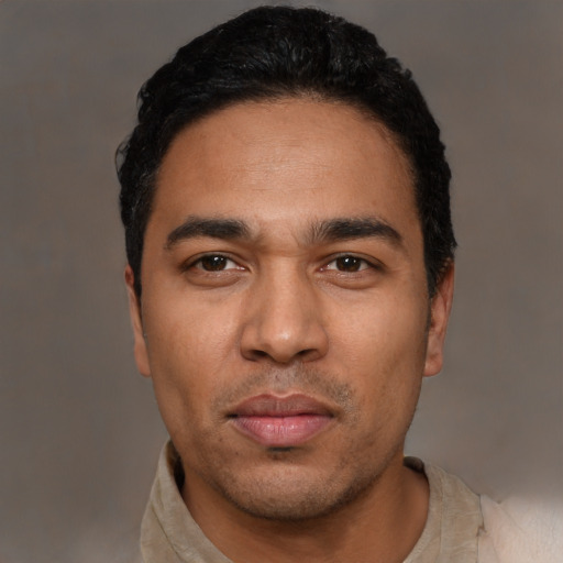 Neutral latino young-adult male with short  black hair and brown eyes