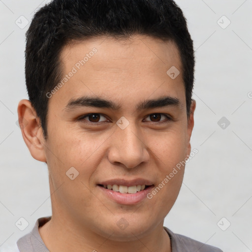 Joyful latino young-adult male with short  brown hair and brown eyes