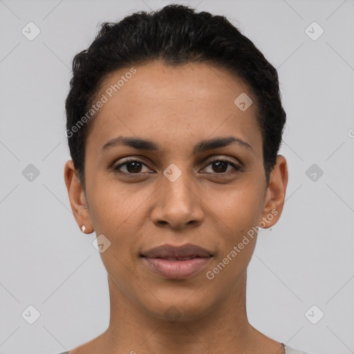 Joyful latino young-adult female with short  black hair and brown eyes