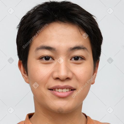 Joyful asian young-adult male with short  brown hair and brown eyes