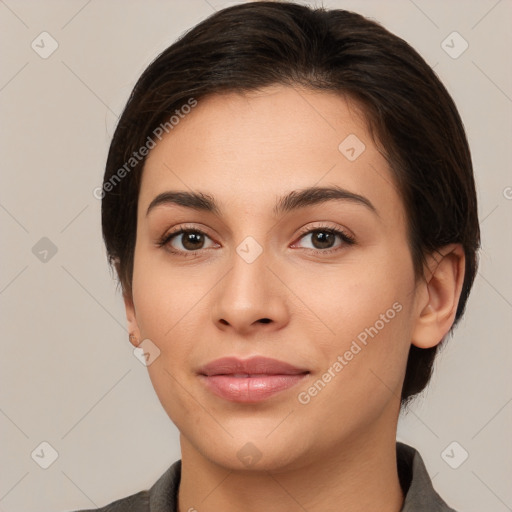 Joyful white young-adult female with medium  brown hair and brown eyes