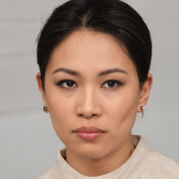 Neutral asian young-adult female with short  brown hair and brown eyes