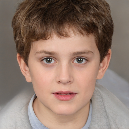 Joyful white child male with short  brown hair and brown eyes