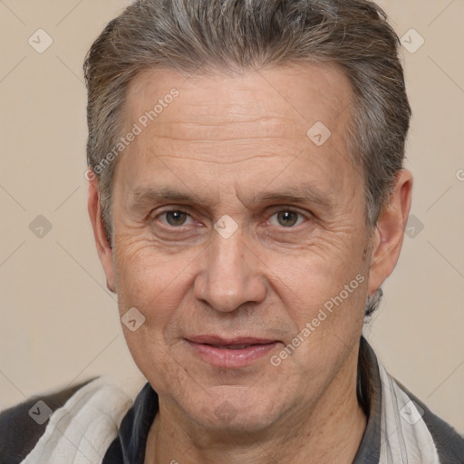 Joyful white middle-aged male with short  brown hair and brown eyes