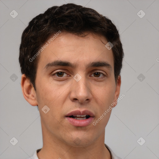 Neutral white young-adult male with short  brown hair and brown eyes