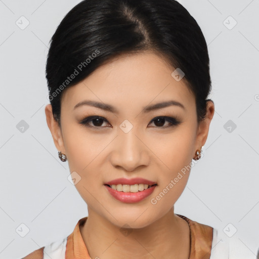 Joyful asian young-adult female with short  black hair and brown eyes