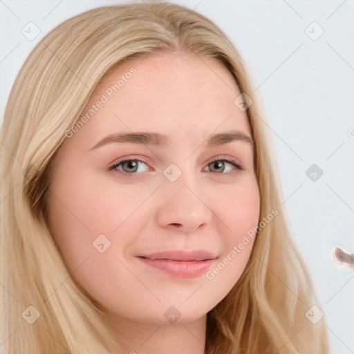 Joyful white young-adult female with long  brown hair and blue eyes