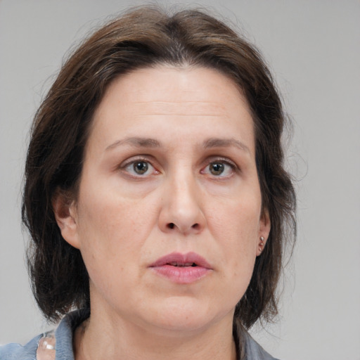 Neutral white adult female with medium  brown hair and brown eyes