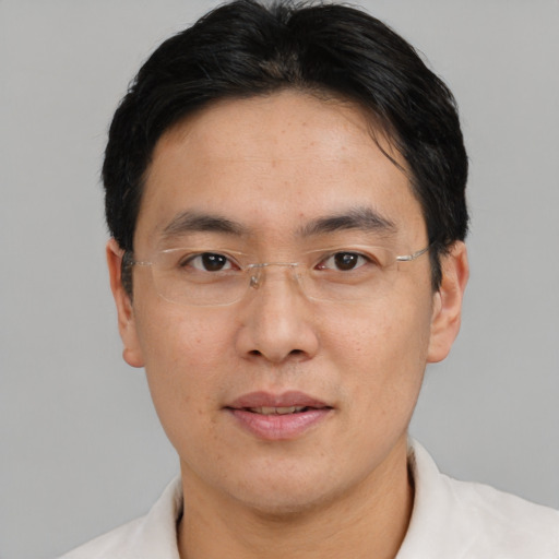 Neutral asian adult male with short  black hair and brown eyes