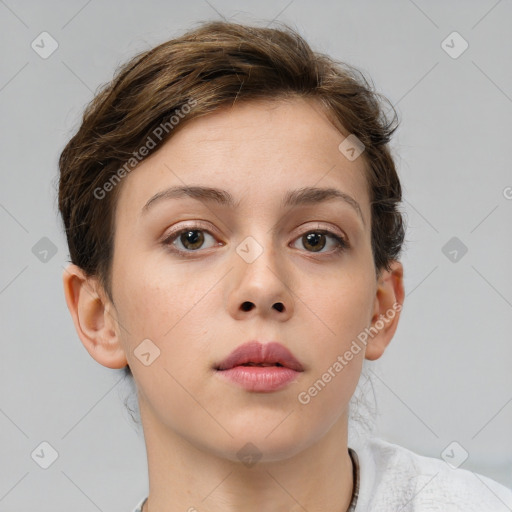 Neutral white young-adult female with short  brown hair and brown eyes