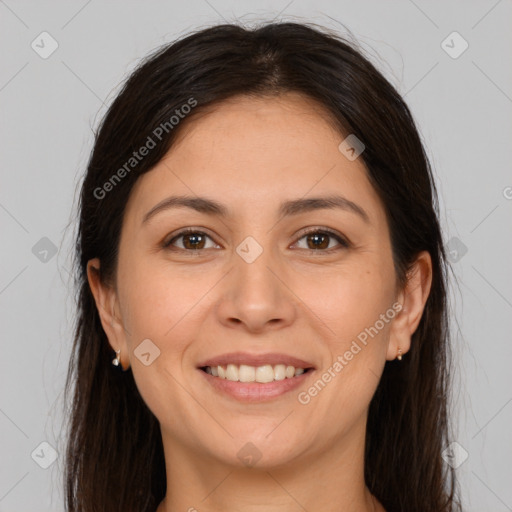 Joyful white young-adult female with long  brown hair and brown eyes