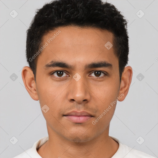 Neutral latino young-adult male with short  brown hair and brown eyes