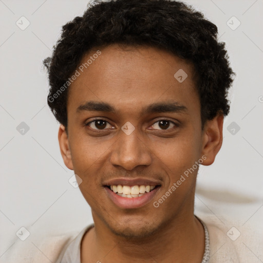 Joyful black young-adult male with short  brown hair and brown eyes