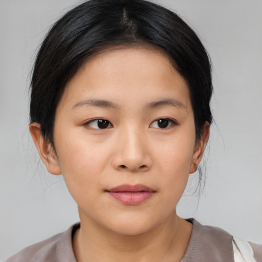 Neutral asian young-adult female with medium  brown hair and brown eyes
