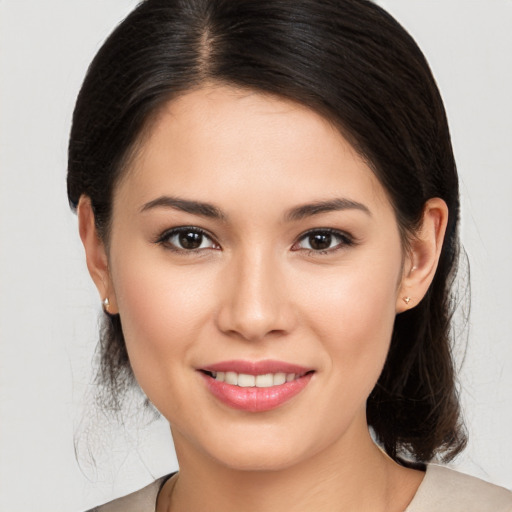 Joyful white young-adult female with medium  brown hair and brown eyes