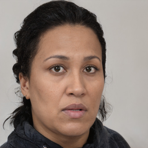 Neutral white adult female with medium  brown hair and brown eyes