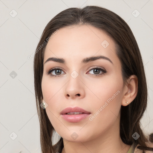 Neutral white young-adult female with long  brown hair and brown eyes