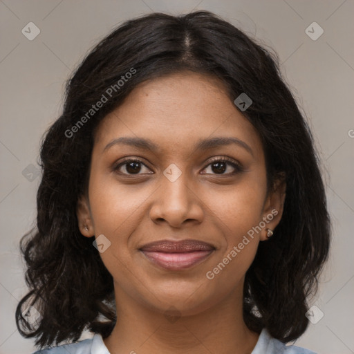 Joyful black young-adult female with medium  brown hair and brown eyes