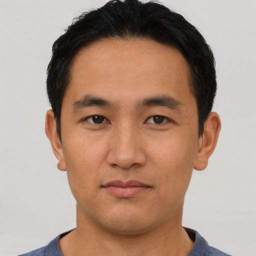 Neutral asian young-adult male with short  black hair and brown eyes