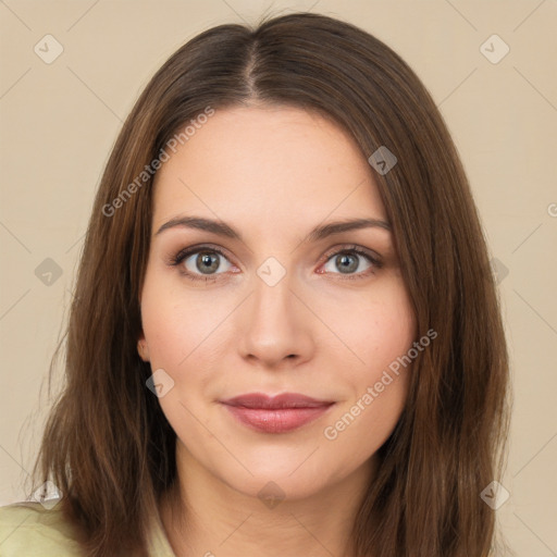 Joyful white young-adult female with long  brown hair and green eyes