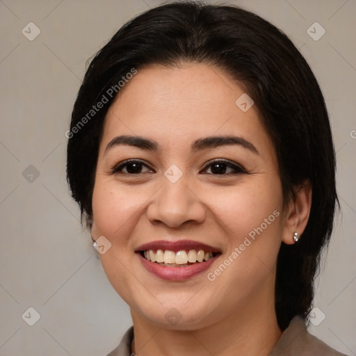 Joyful asian young-adult female with medium  brown hair and brown eyes