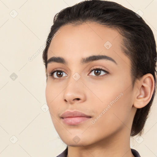 Neutral white young-adult female with long  brown hair and brown eyes