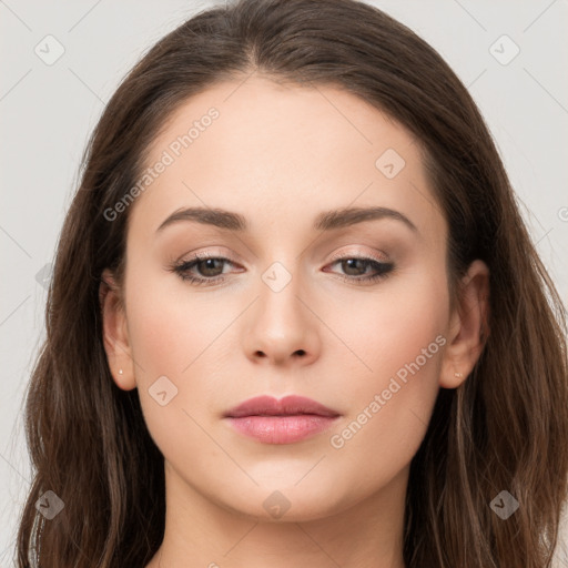 Neutral white young-adult female with long  brown hair and brown eyes