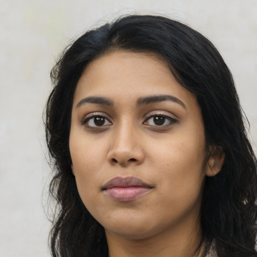 Neutral latino young-adult female with long  black hair and brown eyes