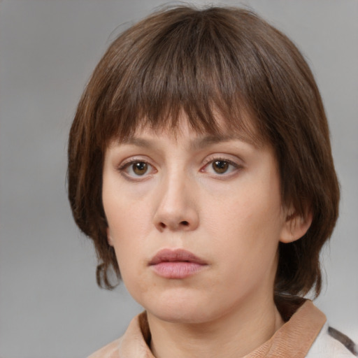 Neutral white young-adult female with medium  brown hair and brown eyes